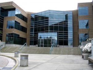 Front lobby entrance of building 17, one of the largest buildings on the Main Campus portion of Microsoft's Redmond campus. The circle in the lower-left is where cars drive up. Taken by Derrick Coetzee in April 2005, who releases all rights to the work and releases it into the public domain.