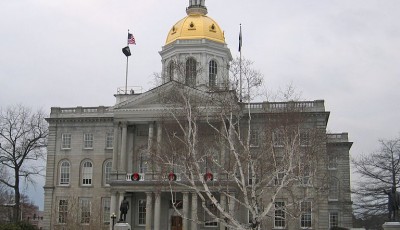 Photograph of Concord, New Hampshire state house. The building was built by Stuart J. Park from granite quarried from Concord, New Hampshire. Construction began 1816 and was completed in 1819.